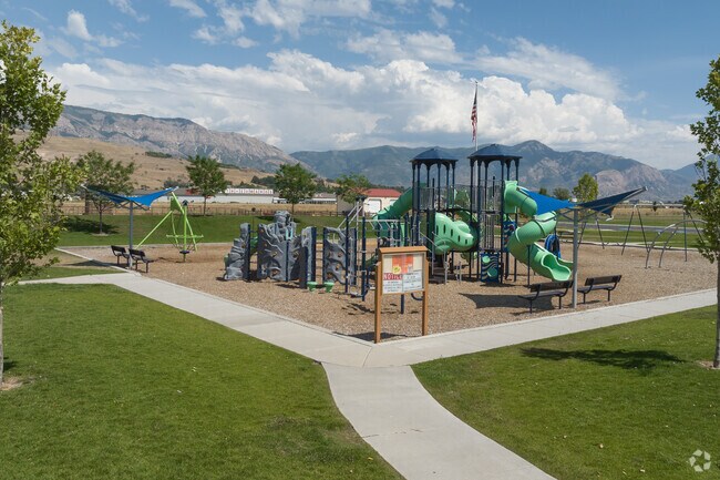 Smith Family Park’s playground has a zipline, slides, and a rock wall.