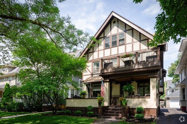 This Tudor style home has a view of Cobbs Hill Park from its front porch.