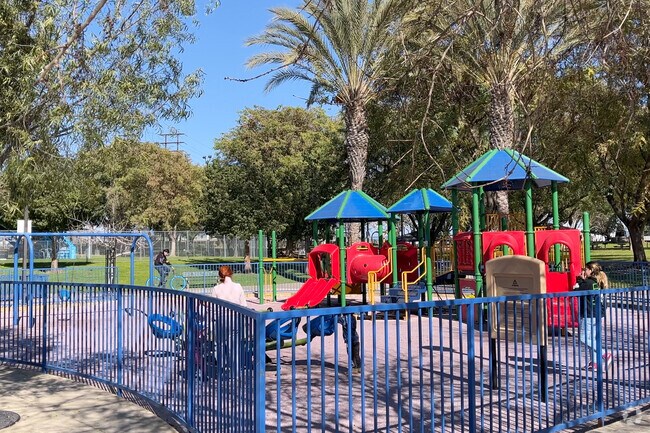 Kids play at the playground in Riverfront Park.