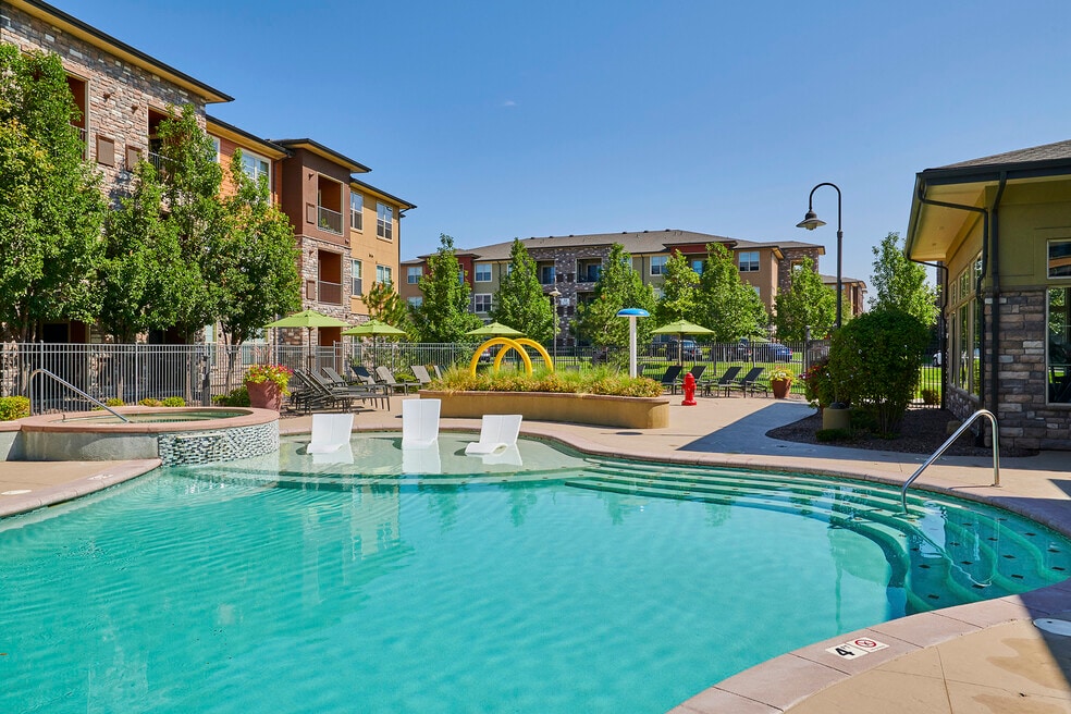 Resort-inspired pool with tanning shelf