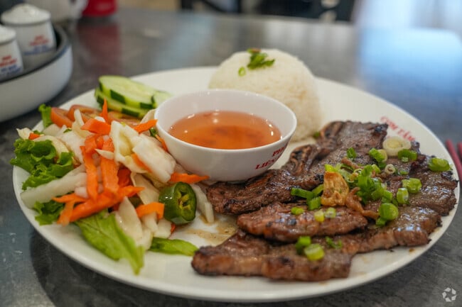 Stop in at Pho Lien Hoa to try the short rib dinner plate.