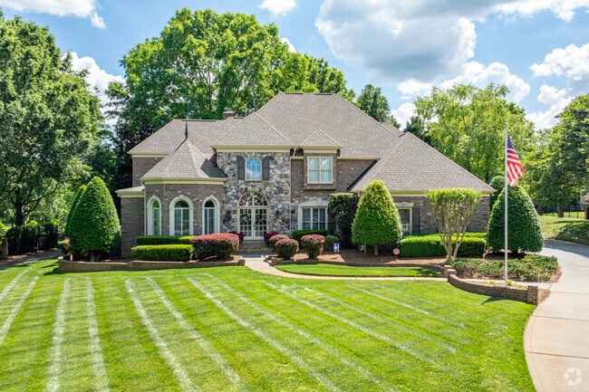 Providence Country Club has many beautiful homes with gorgeous yards in Providence.