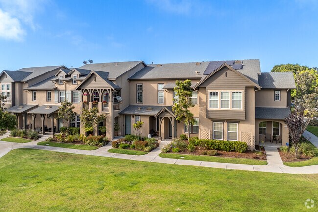Large townhomes are common near The Collection in the El Rio Westneighborhood