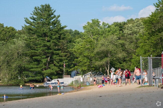 Moosup Pond Beach is where locals cool off, relax, and enjoy classic New England lake days.