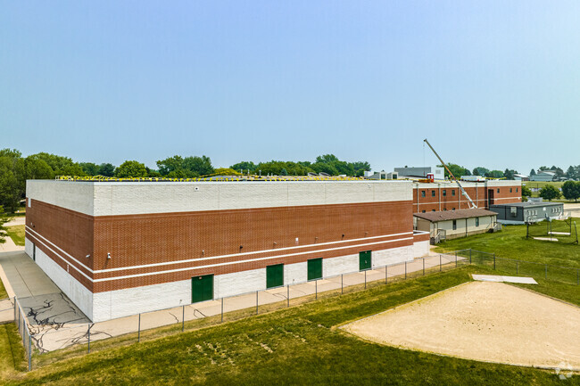 The rear of Waunakee Middle School, with its baseball diamond.