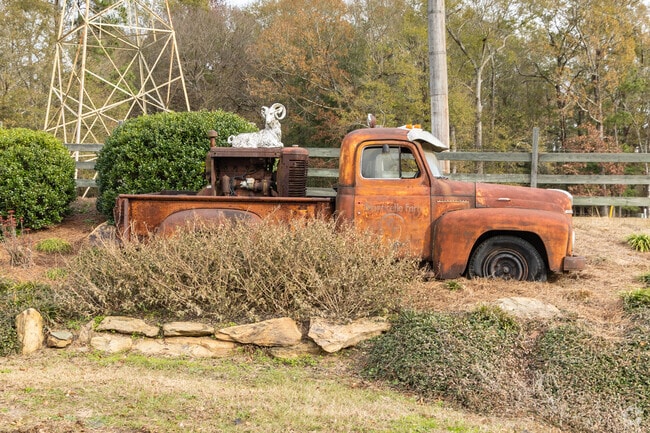 A vintage farm cart hints at Far North Columbia’s rural roots.