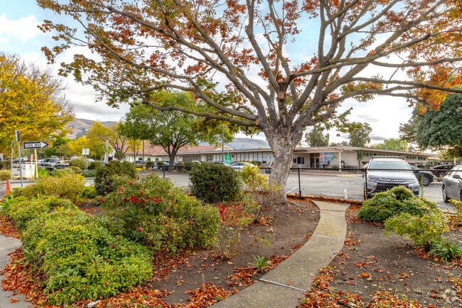 The entrance to St. Victor Elementary School with beautiful fall views.