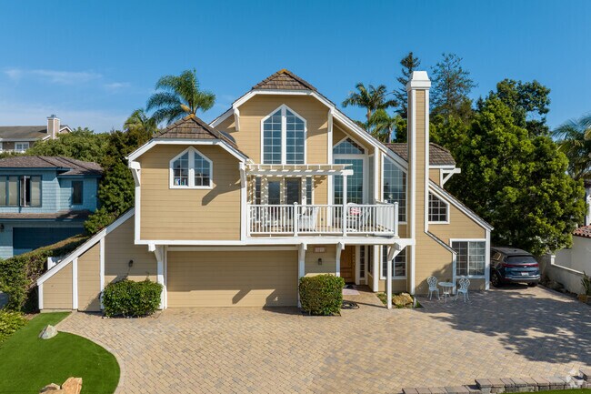 This custom home that looks like it could be in home and garden magazine in La Costa.