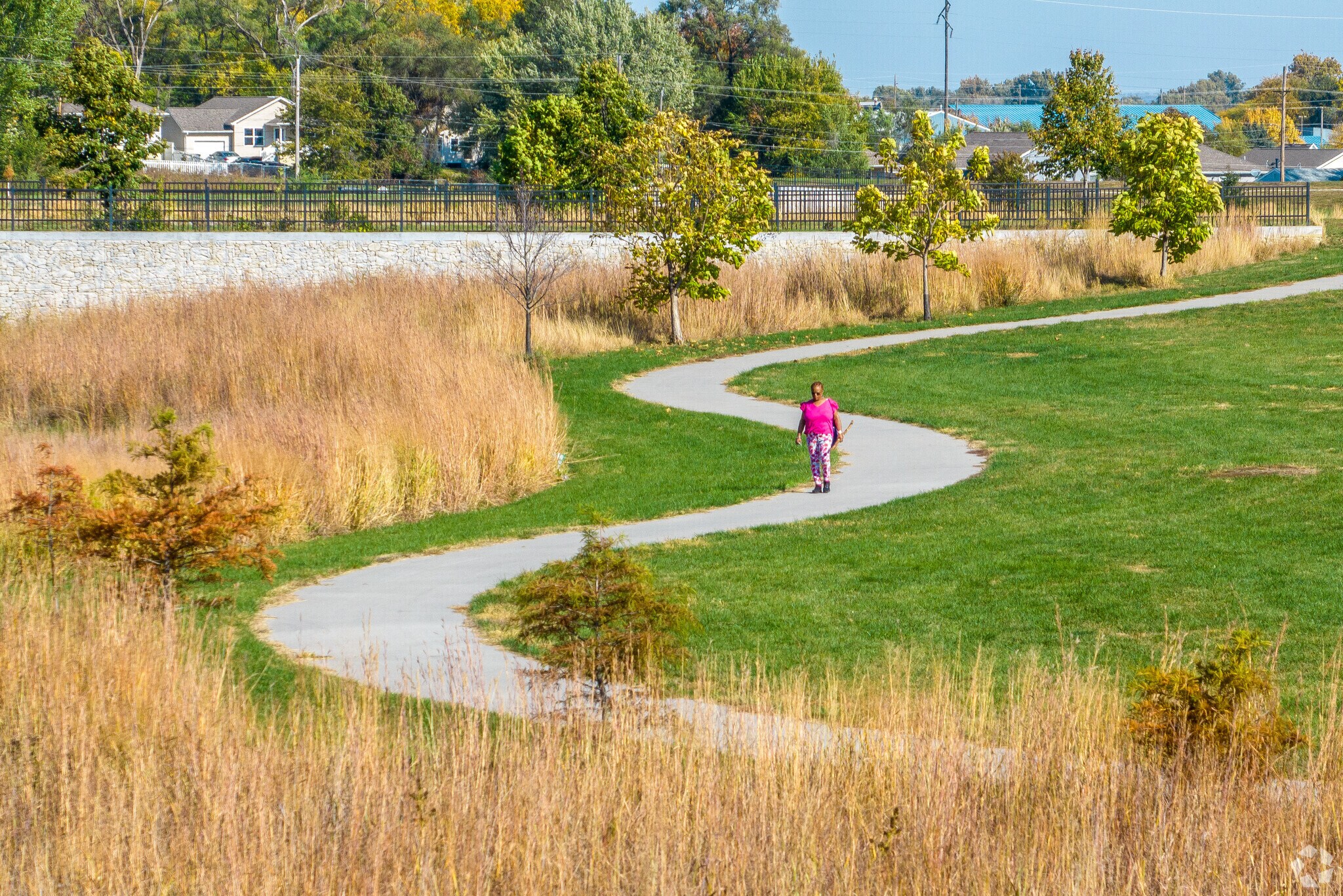 Residents of Erskine Park have access to the expanse of Adams Park and its paved trails.