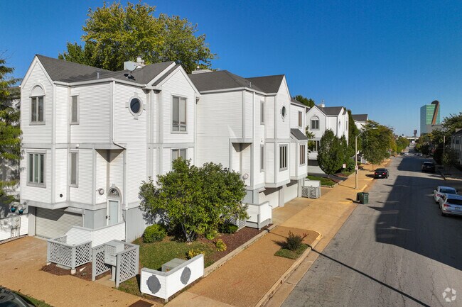 Two story townhouse community in Columbus Square neighborhood.