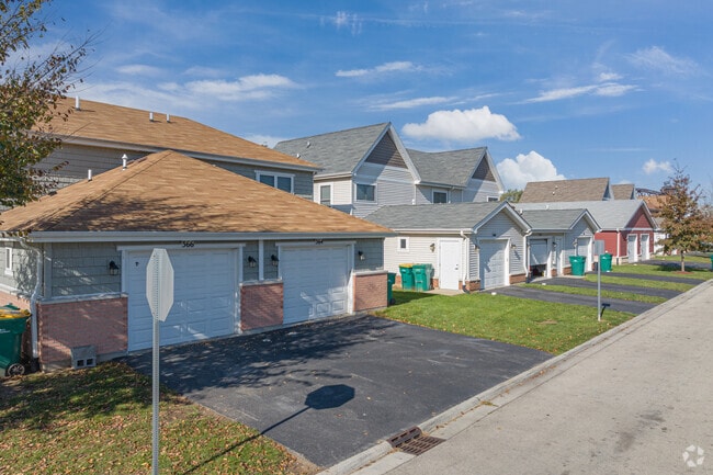 Home buyers in Southside Joliet are greeted with two-bedroom condos with yards.