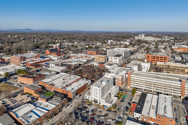 Gainesville is a rapidly expanding town nestled at the base of the picturesque North Georgia foothills, surrounded by lush greenery and scenic landscapes.