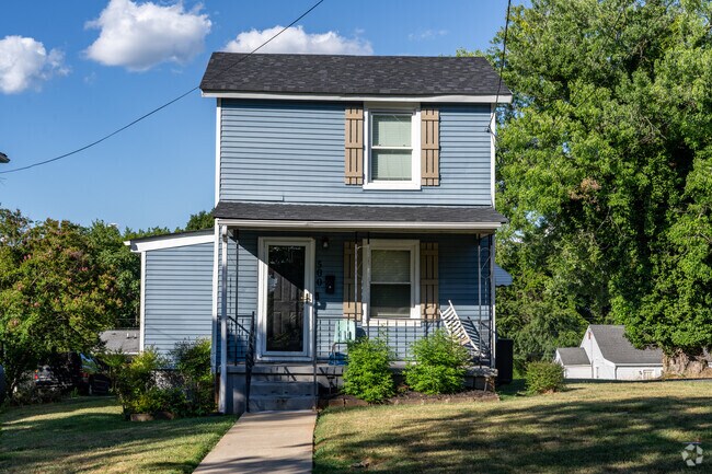Classic Colonial-style homes stand in Lynchburg's Dearington neighborhood.