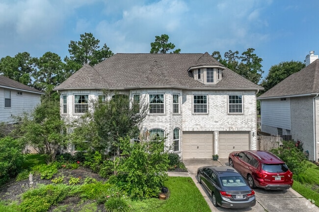 A two-story, Queen-Anne inspired home with a spiral staircase in Northgate Crossing.