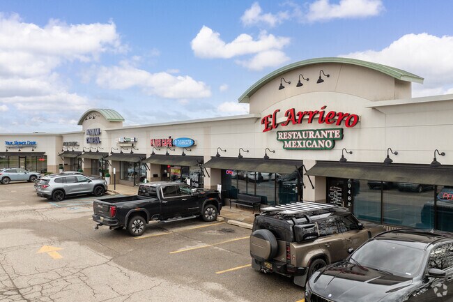 Strip malls and chain restaurants line 28th Street running through the center of Kentwood.
