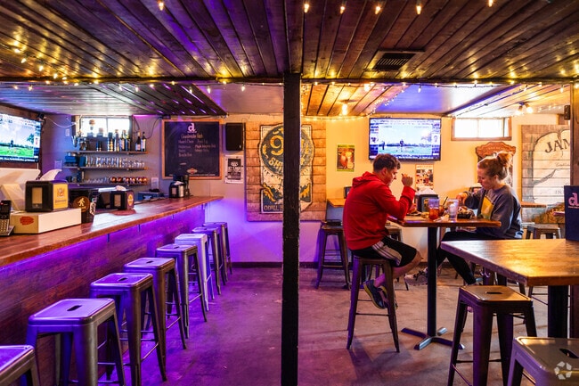 Stop at Demsey's Burger Pub near Crown Heights for a bite to eat.