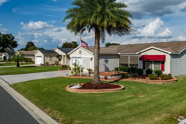 Homes in the Village of Summerhill have two-car garages and well-manicured lawns.