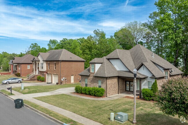 Enjoy the well manicured lawns when walking down this street in Sand Ridge.