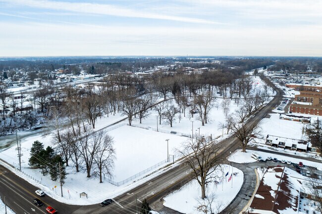 Westside Park near Western Oaks features river views, trails, and a playground.