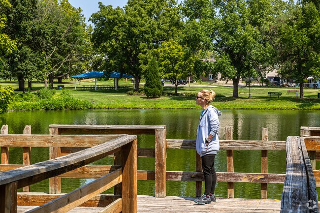 Locals enjoy fishing and walking around the pond at Central Park.