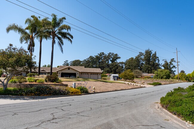 Homes of many styles dot the hills of Los Berros.