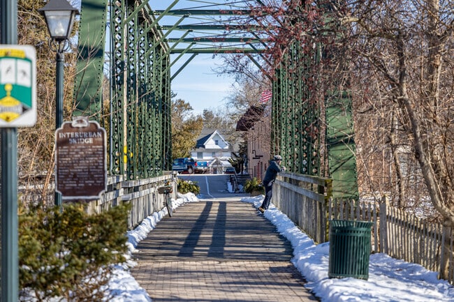 A Cedarburg bicyclist stops to enjoy the view downtown.