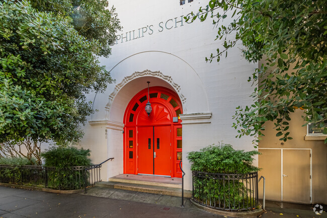 A bright red door greets students and parents to St. Phillips School.