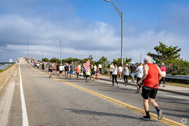 The Over the Bridge Run is sponsored by the Hampton Bays Lions Club.