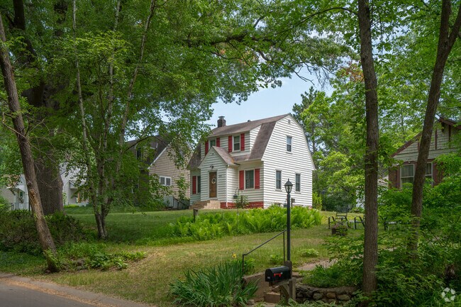 A Colonial style home resting on a hill in Mahtomedi.