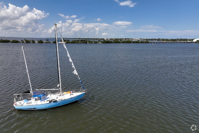 Sailboats are often seen cruising along the Indian River Lagoon near Paradise Beach.