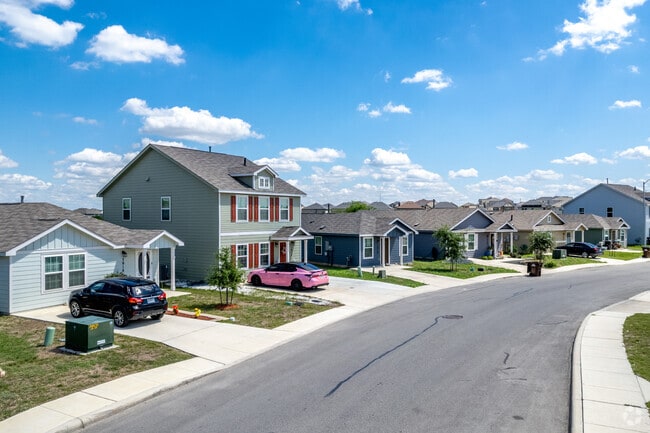 Row of varied-style homes in a Converse, Texas neighborhood.