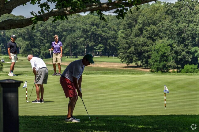 Putting practice at the Rhode Island Country Club mixes sport and fun in equal portions.