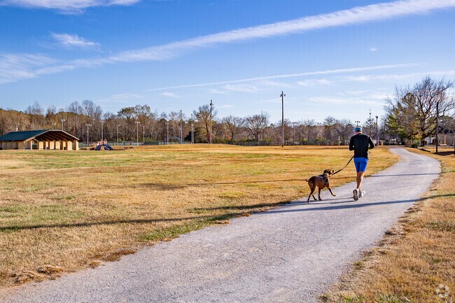 Residents and their best friends can run the rails around Swan Creek Park in Athens.