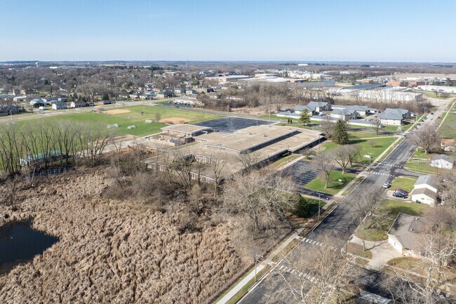 Luther Elementary School is located adjacent to a wetland area.