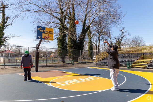 Enjoy a basketball game with friends in Cadwalader Park in Trenton, NJ.
