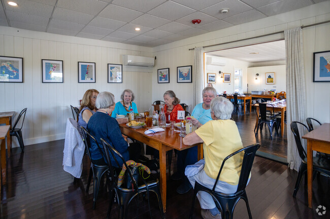 Old friends gather for lunch near Higgins Beach.