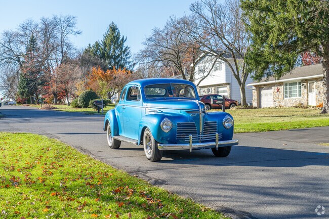 Classic cars occasionally cruise the tree-lined streets in Hanover Township Northampton.