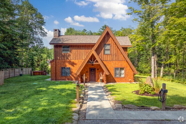 Adirondack-style log cabin owners enjoy their close proximity to Gore Mountain.