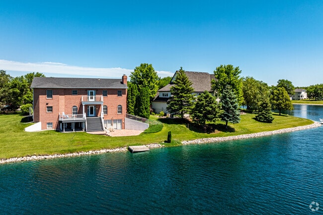 Rows of homes in Bluemont Lakes offer a picturesque neighborhood with modern amenities.