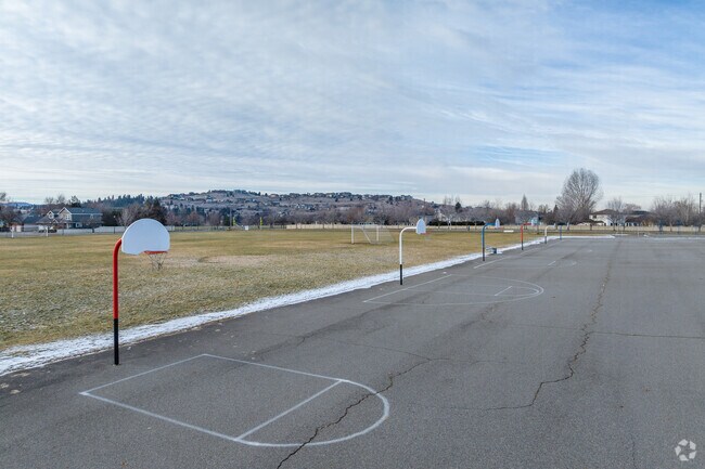 Liberty lake Elementary features several basketball courts behind the school.