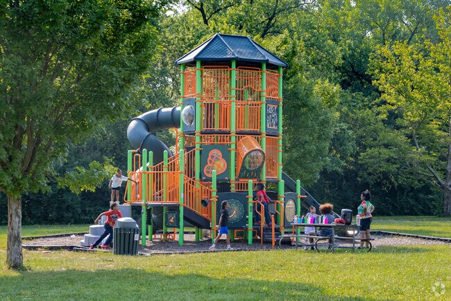 A group of Highview Hills children are enjoying the playground.