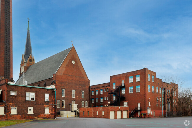 Holy Name Elementary School's brick school, is a sturdy icon of learning, welcoming generations.