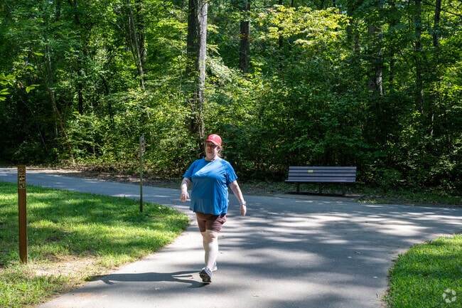 Residents of Lewisville enjoy the many walking trails at nearby local parks.