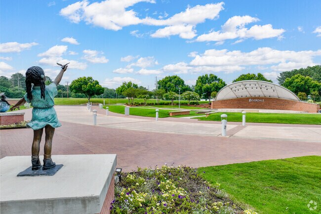 Riverdale's Town Center is fitted with inviting amenities like an amphitheater and splash pad.