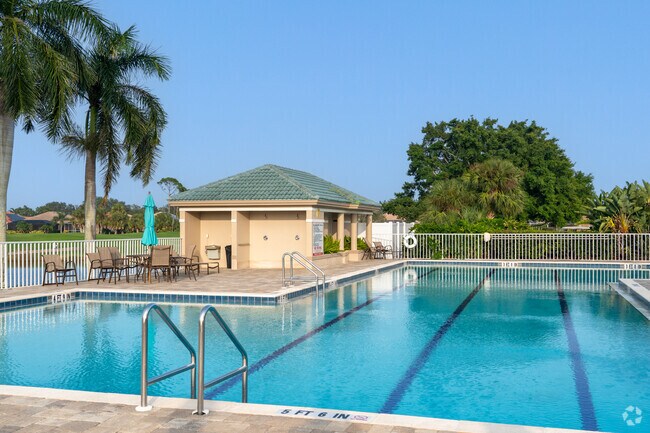 Relax by the pool at the clubhouse in Pelican Pointe.