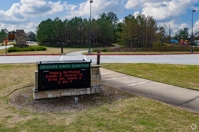 The sign at Creekside Forest Elementary School displays school announcements.