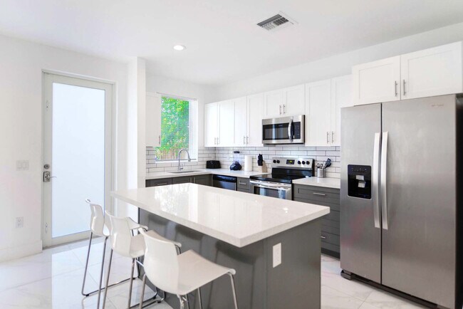 1175 NW 26th St unit FL1-ID1022299P, Miami, FL 33127 - photo 3