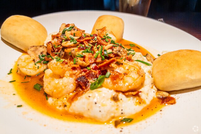 Village Tavern is renowned for their delicious Shrimp & Grits.