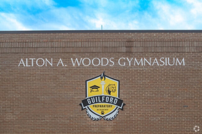 View of the Guilford Preparatory Academy Gymnasium sign in Northeast Greensboro NC.