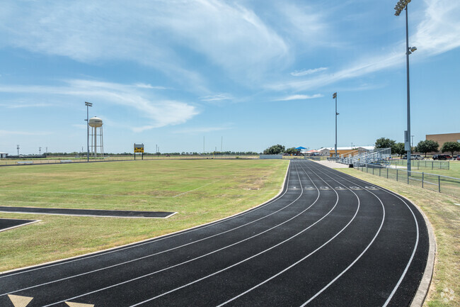 A full size track and field can be found at D J Red Simon Middle School.